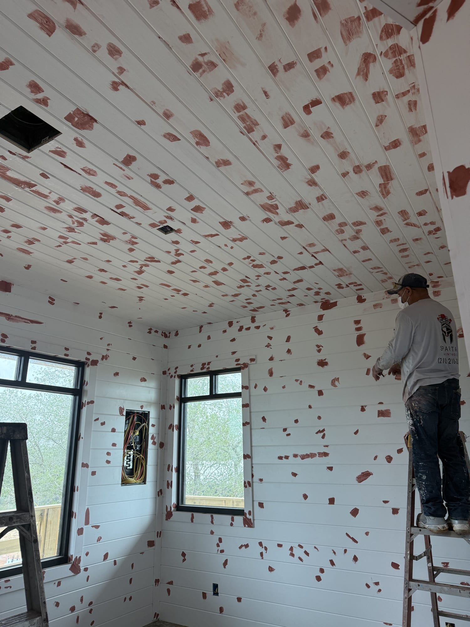 Interior walls and ceiling covered in patch compound before sanding and paint, Spartan Painting